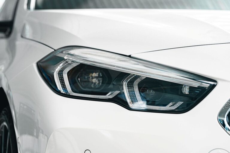 close-up-of-car-headlight-on-white-vehicle-2026-01-08-05-08-30-utc