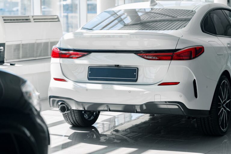 elegant-white-car-in-a-dealership-showroom-2026-01-08-05-08-20-utc
